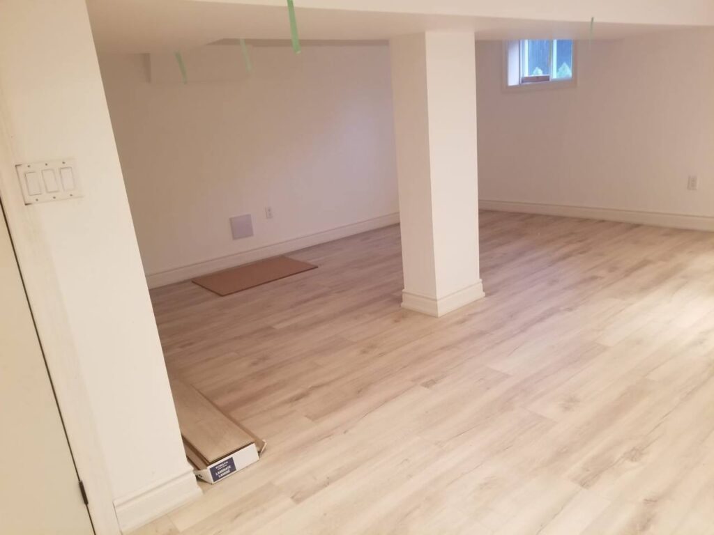 Small basement remodel with new vinyl flooring.