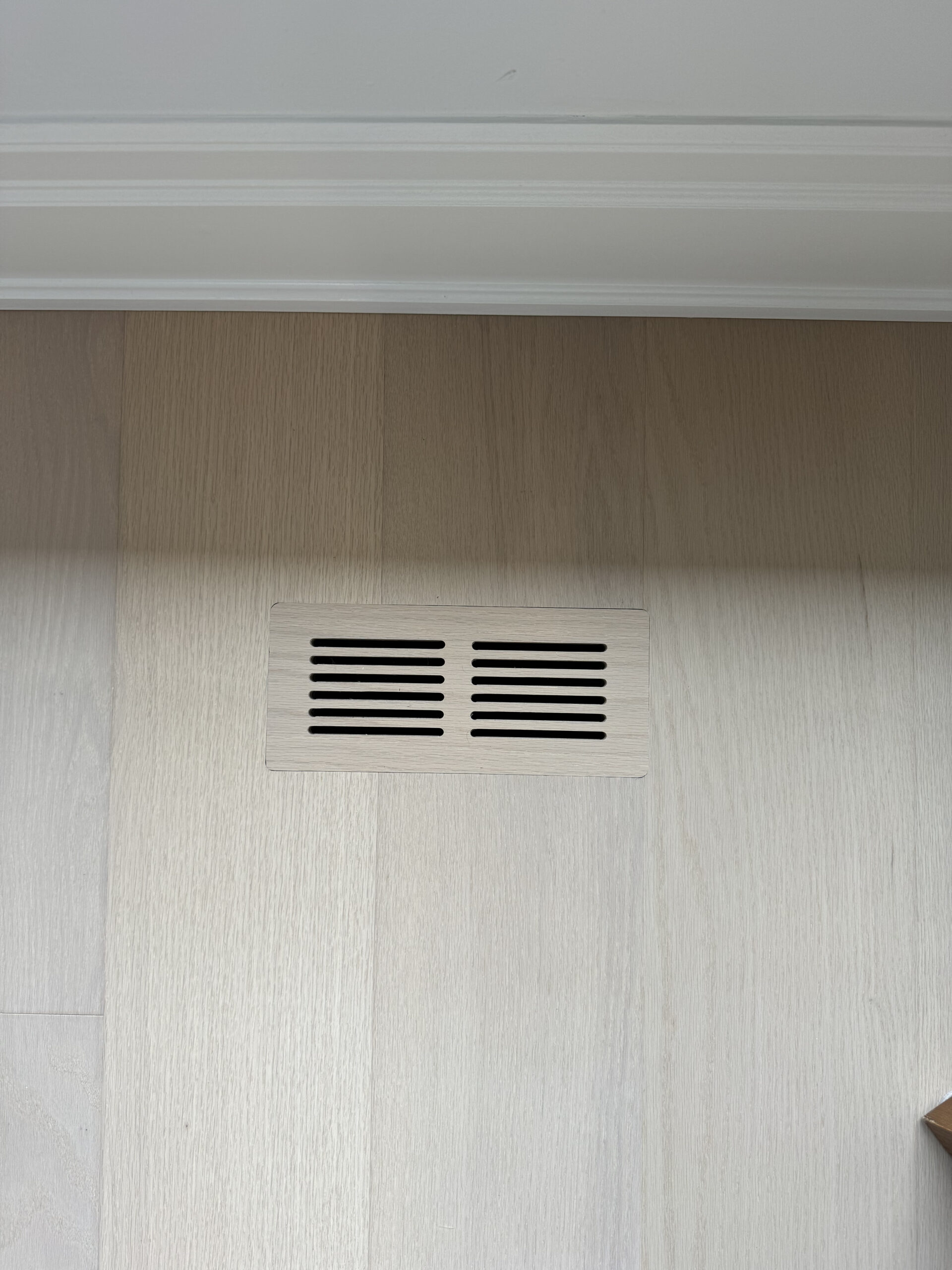 Air vent in hardwood floor