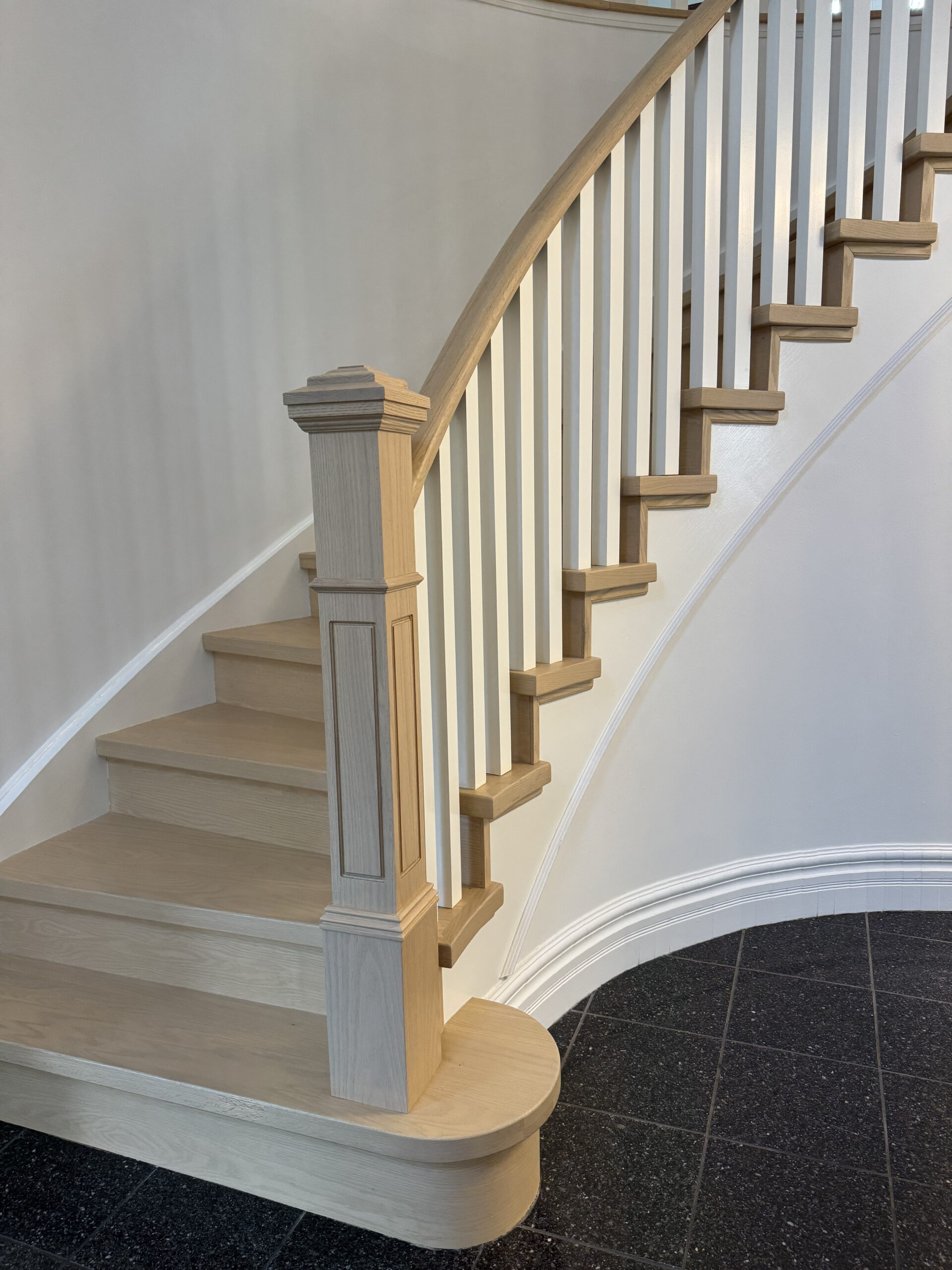 Curved staircase modern renovation