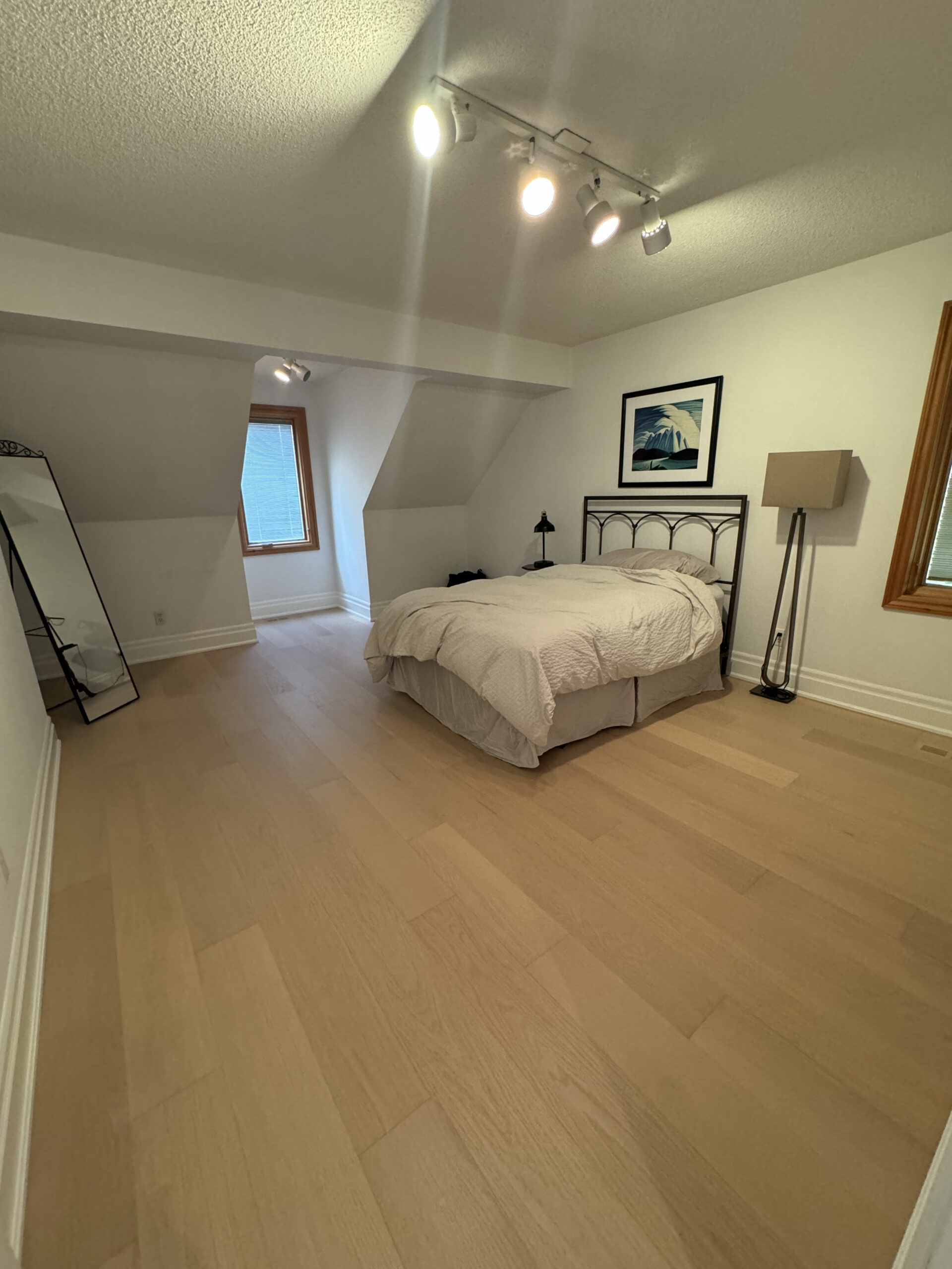 Elegant bedroom hardwood flooring etobicoke