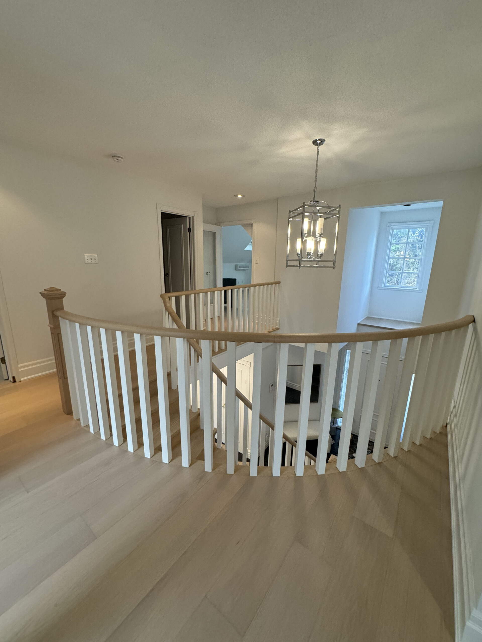 Elegant staircase renovation etobicoke