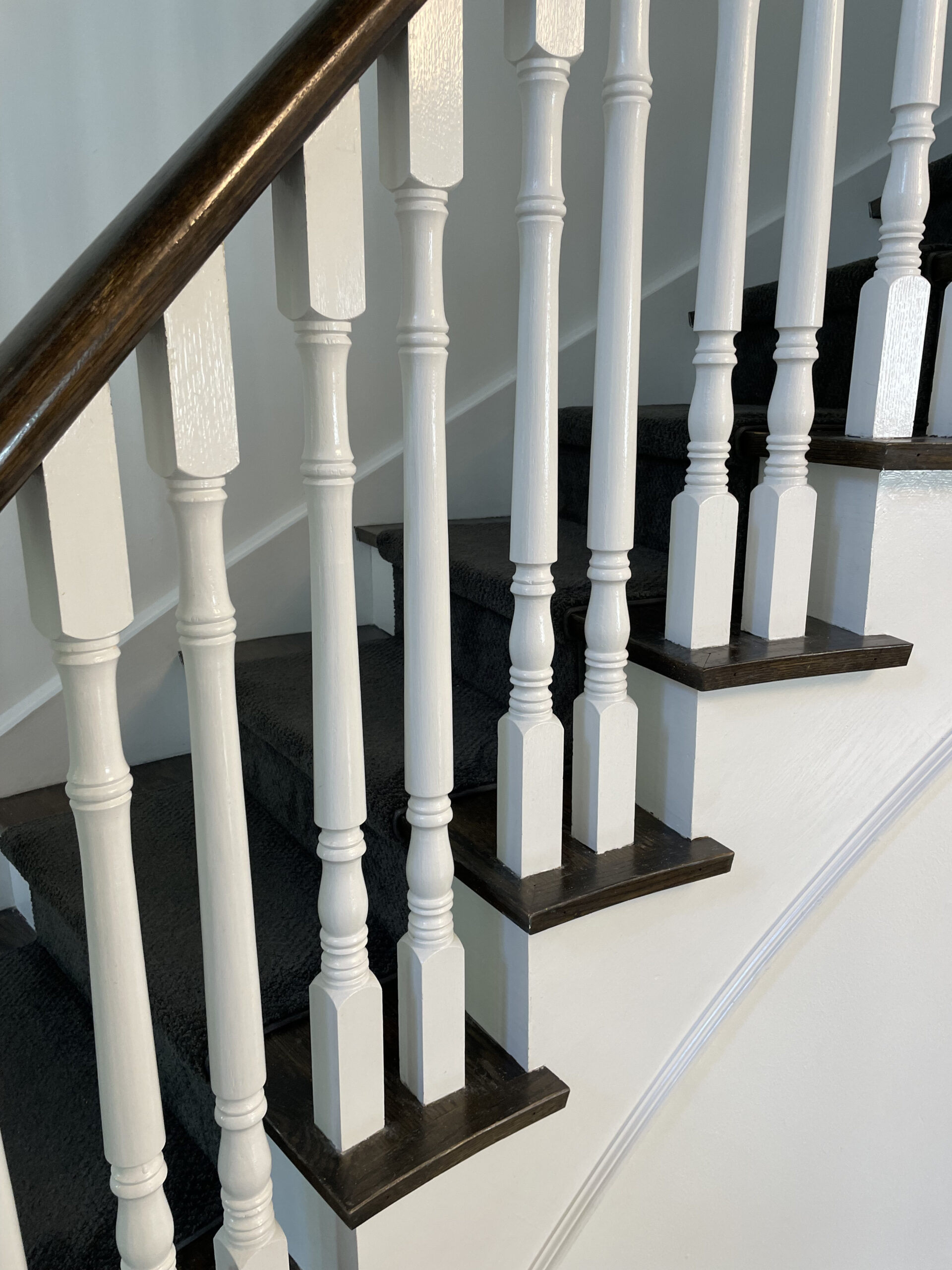 Osoba renos curved staircase spindles before renovation