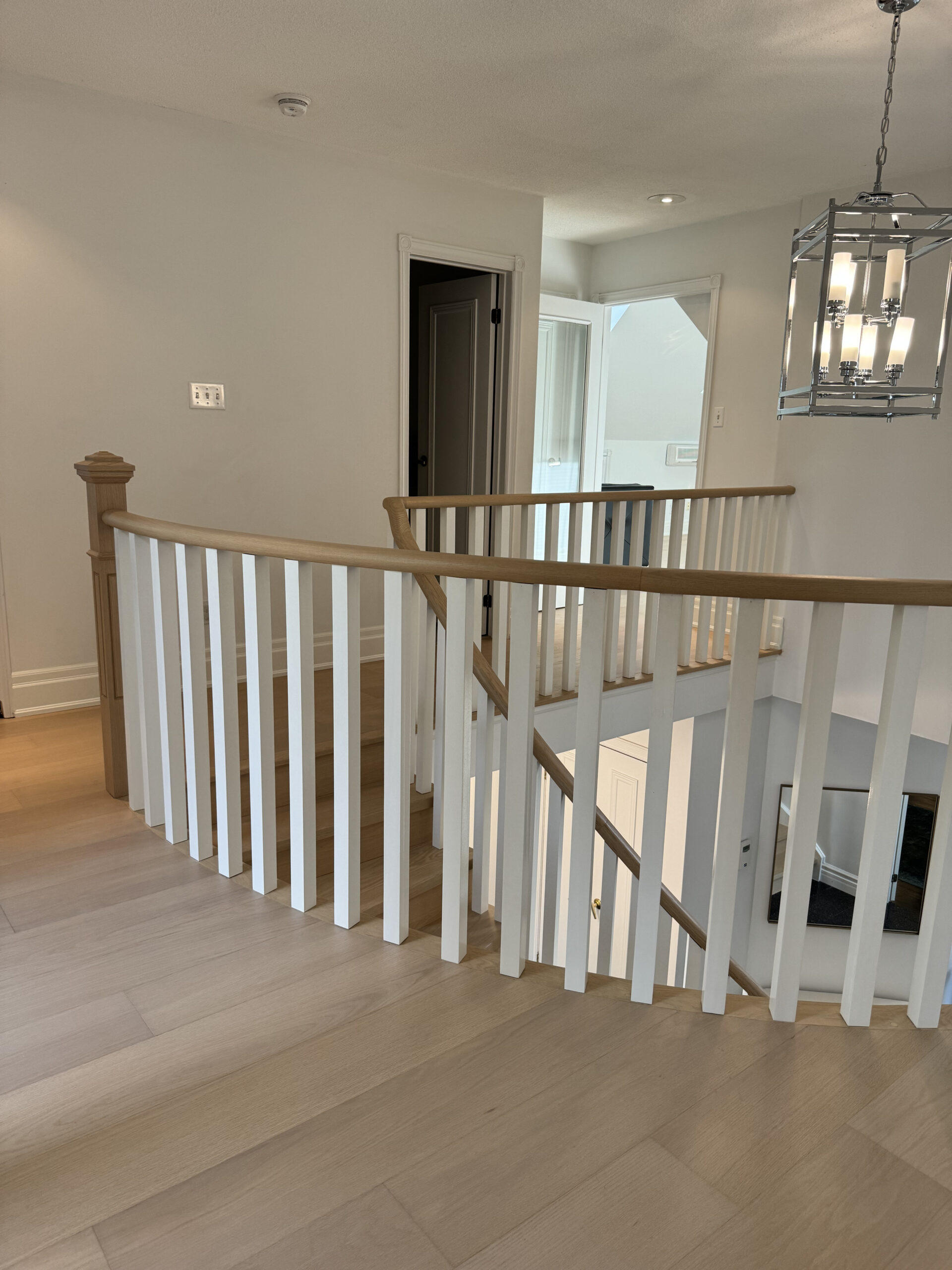 Remodeled upstairs hallway modern lighting