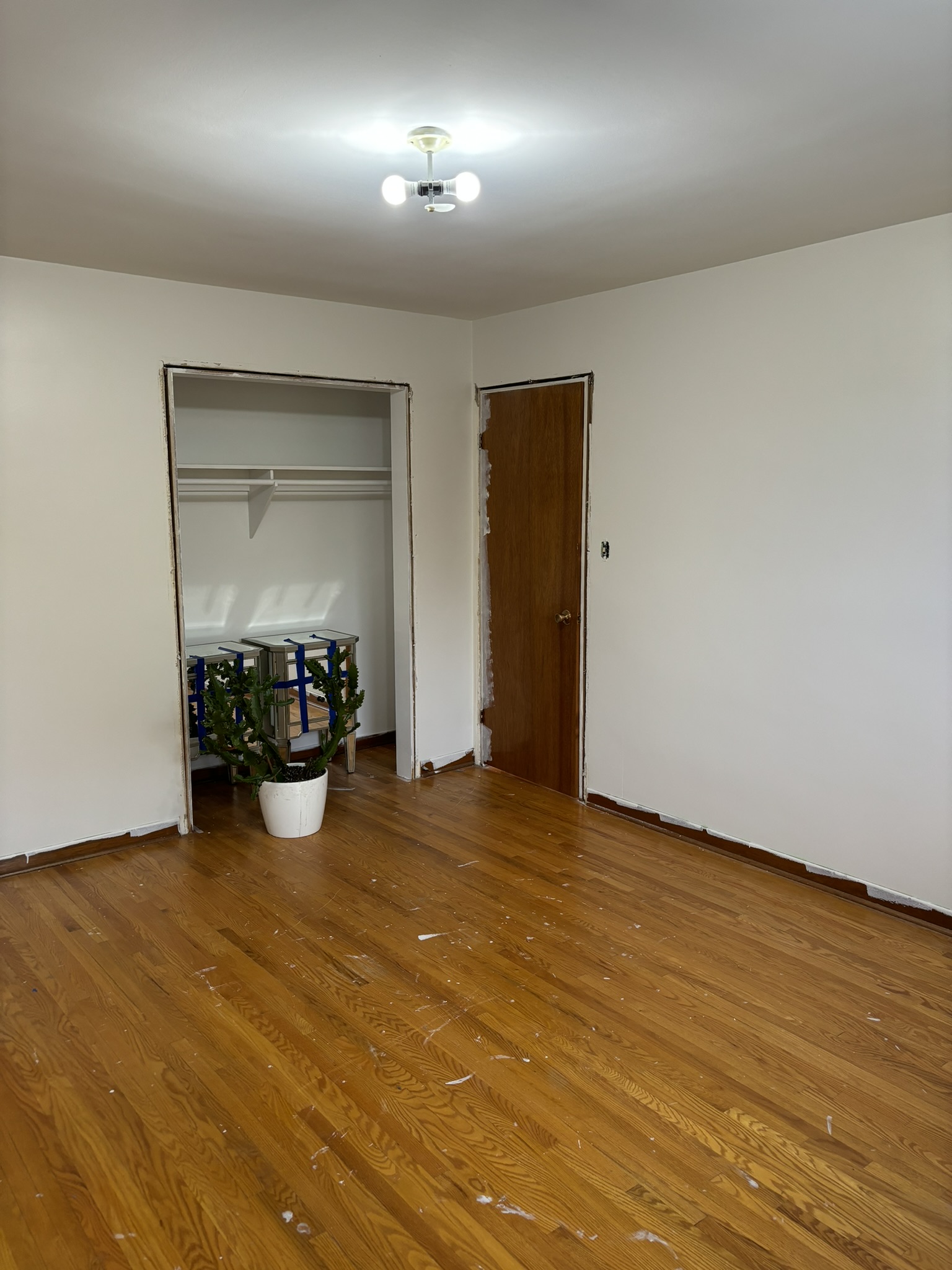 Entire house renovation bedroom flooring closet view