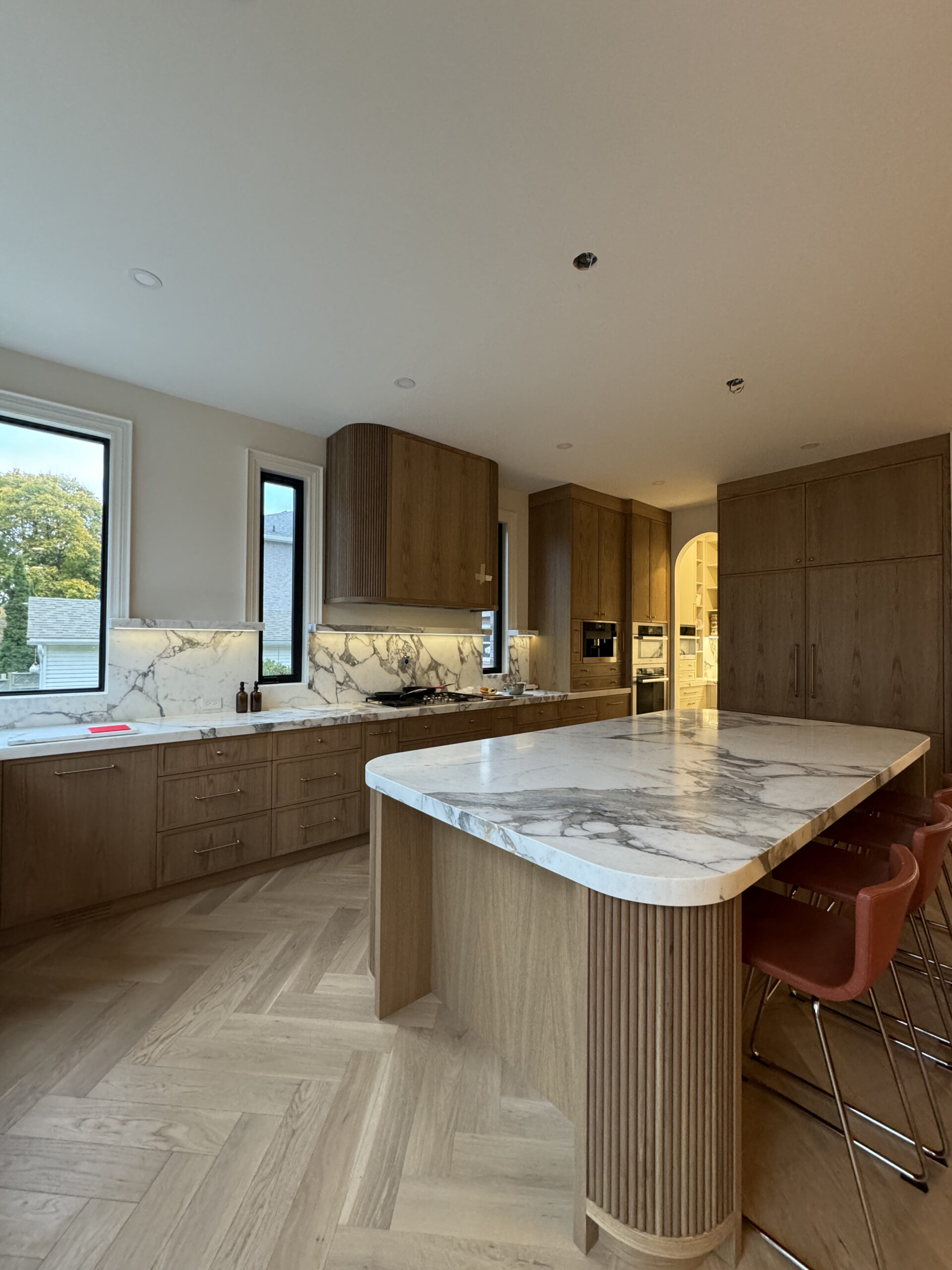 Custom kitchen marble counters wood cabinets