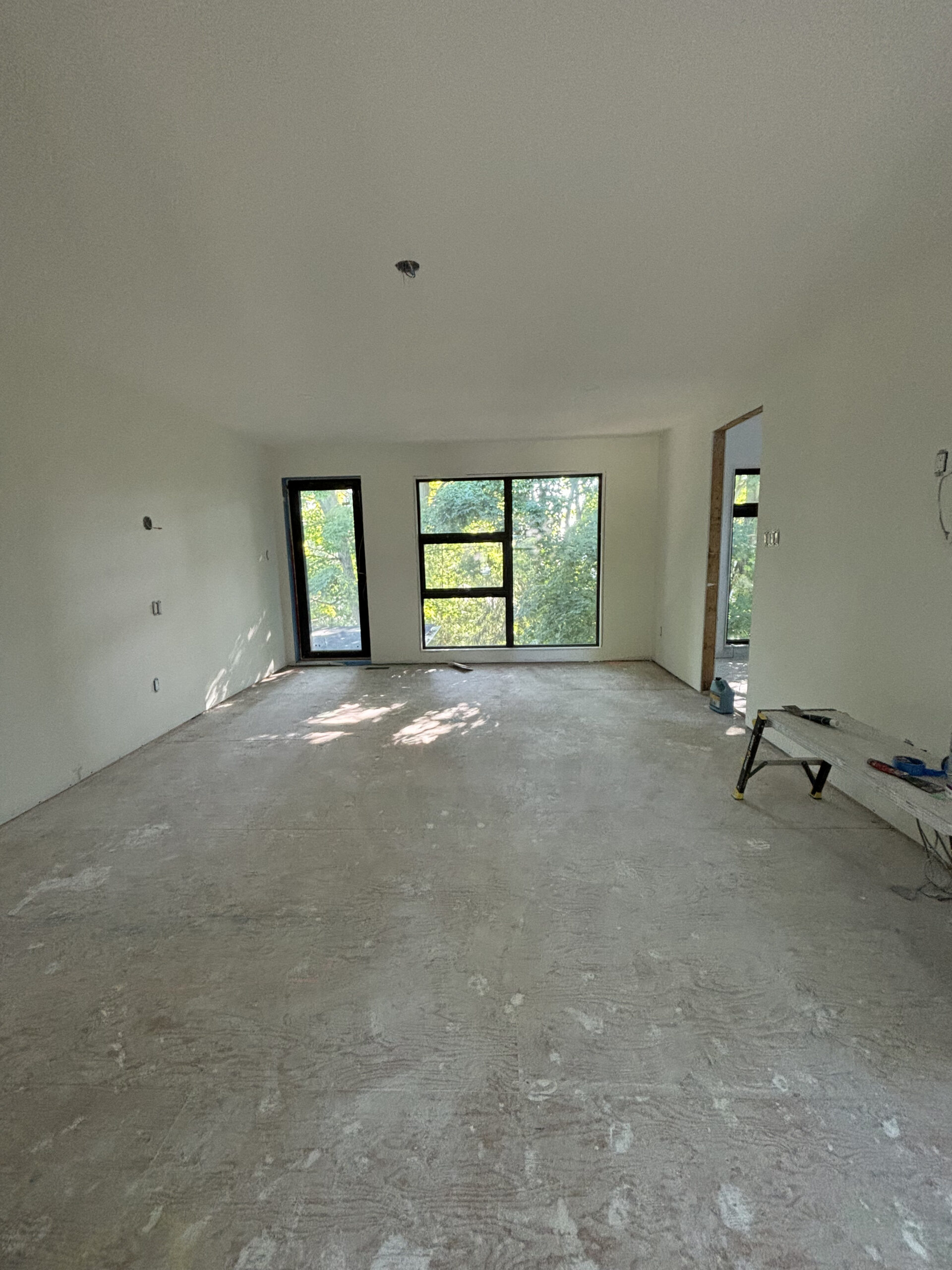 Empty room pre renovation natural light