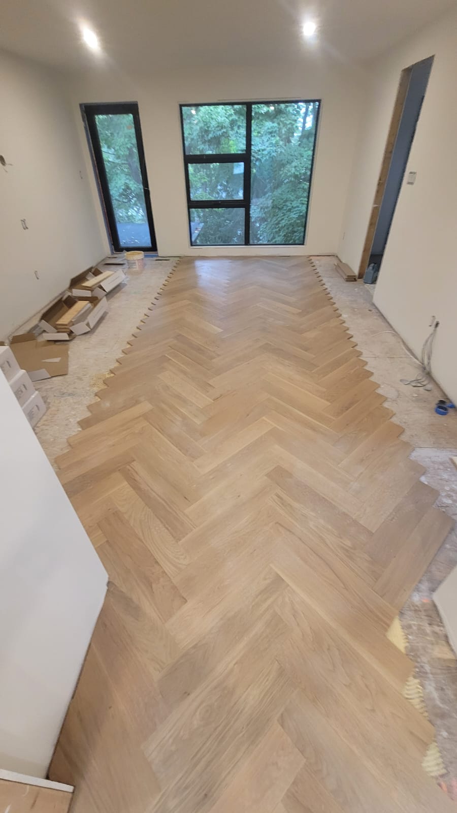 Herringbone flooring installation progress