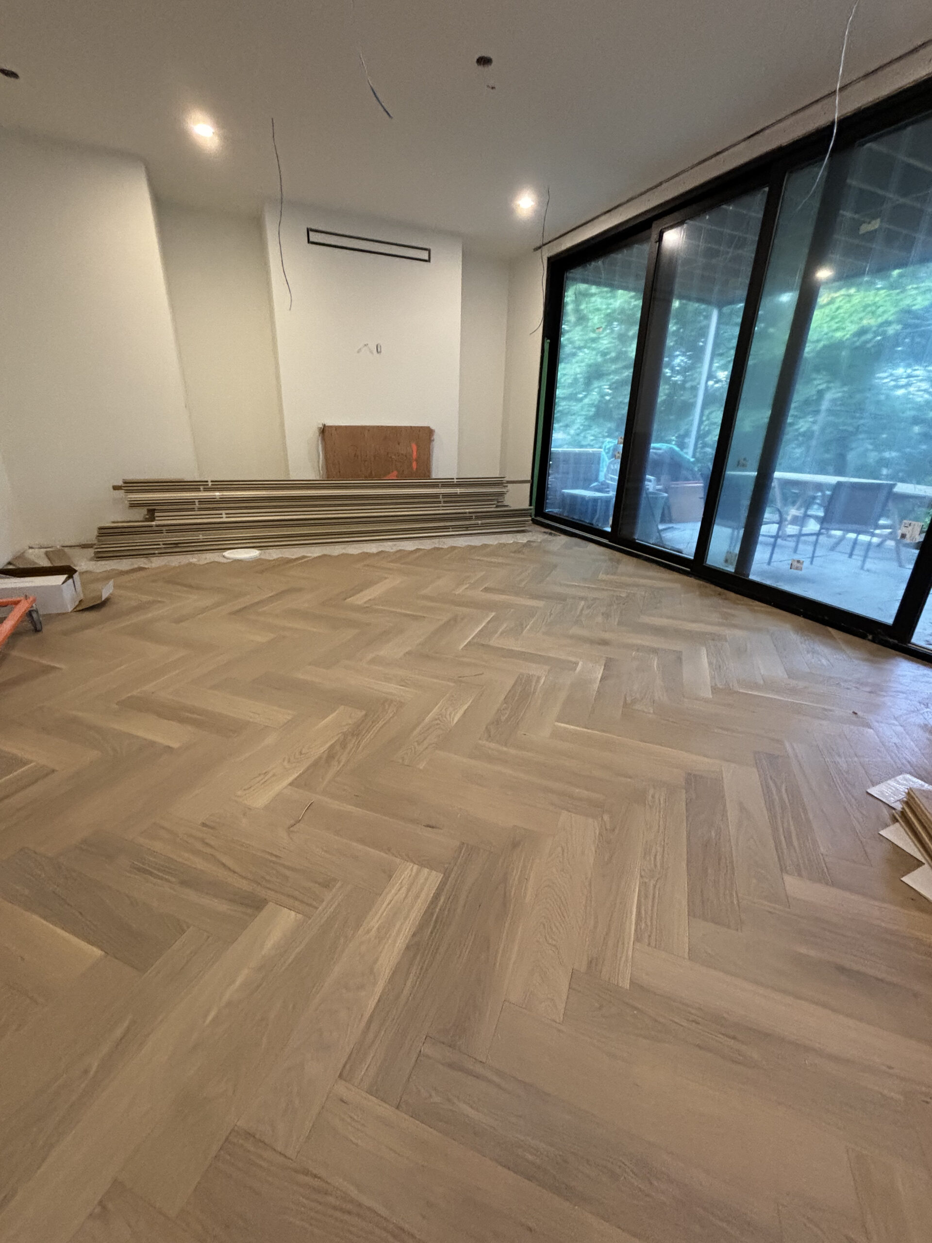 Modern living space herringbone flooring