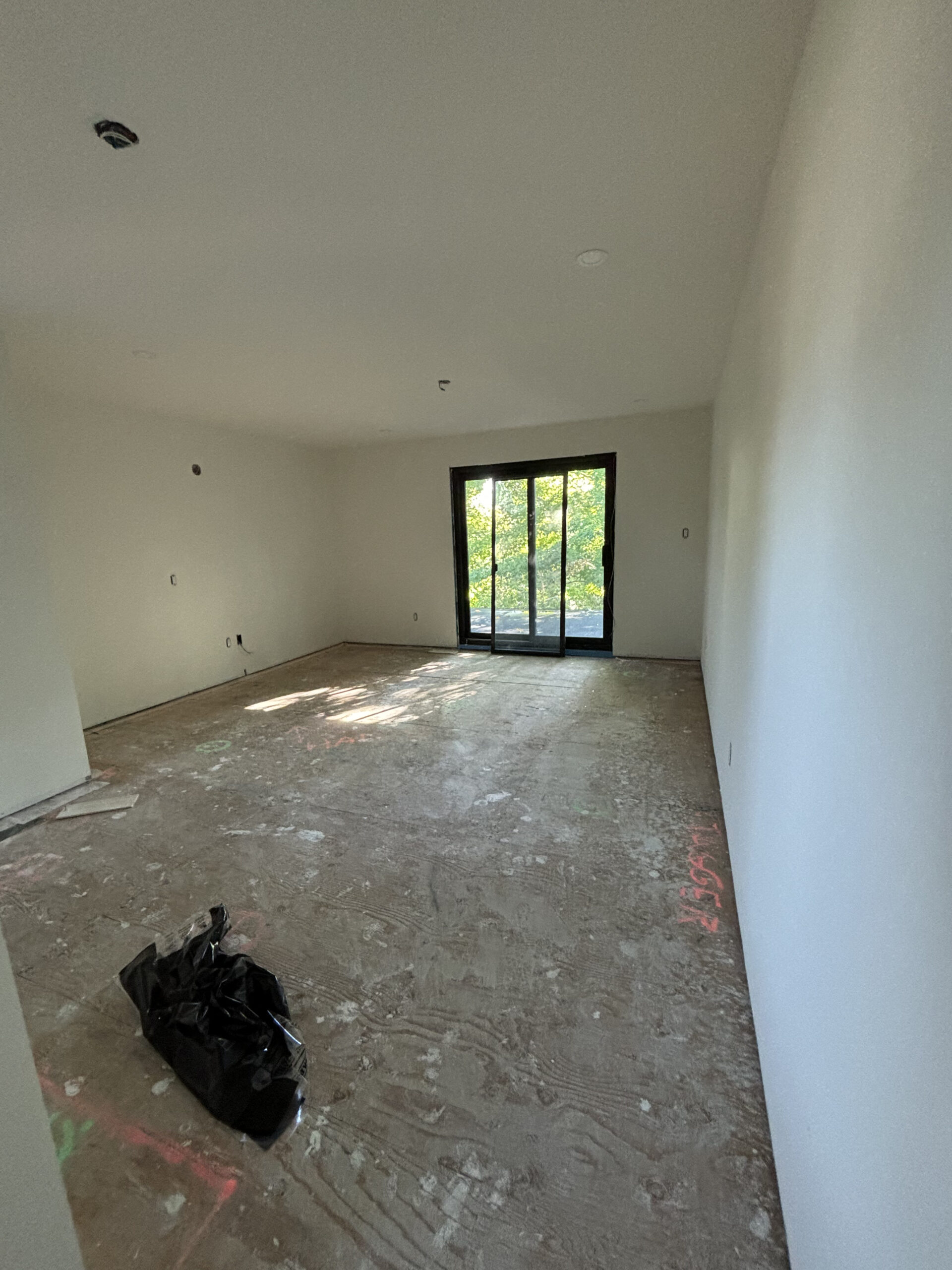 Pre renovation room large glass doors