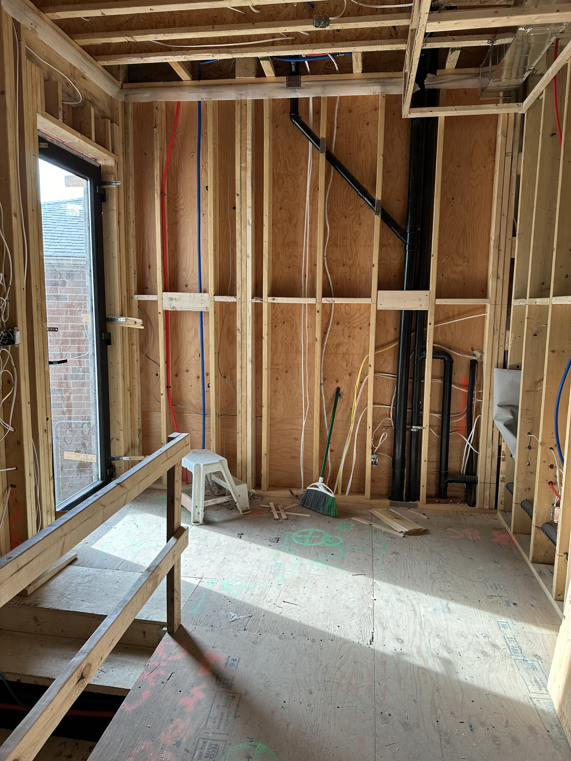 Unfinished laundry room construction