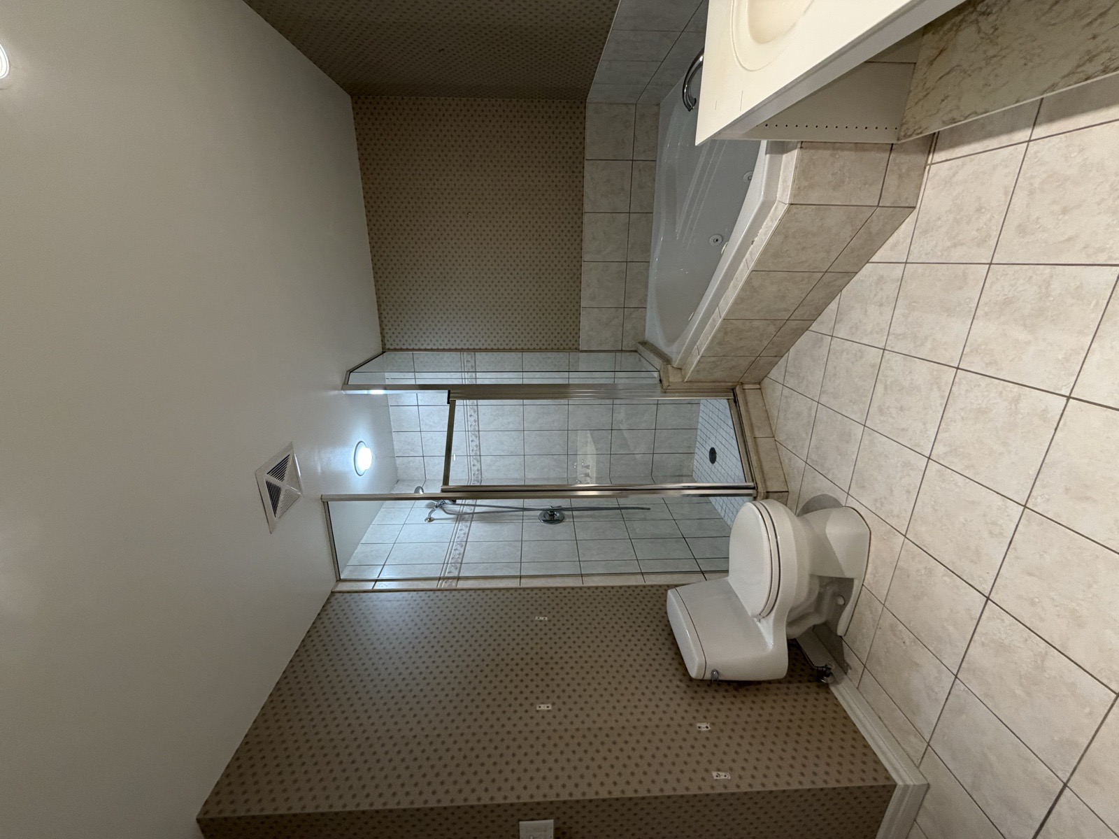 Mississauga luxury condo bathroom renovation before glass shower stall