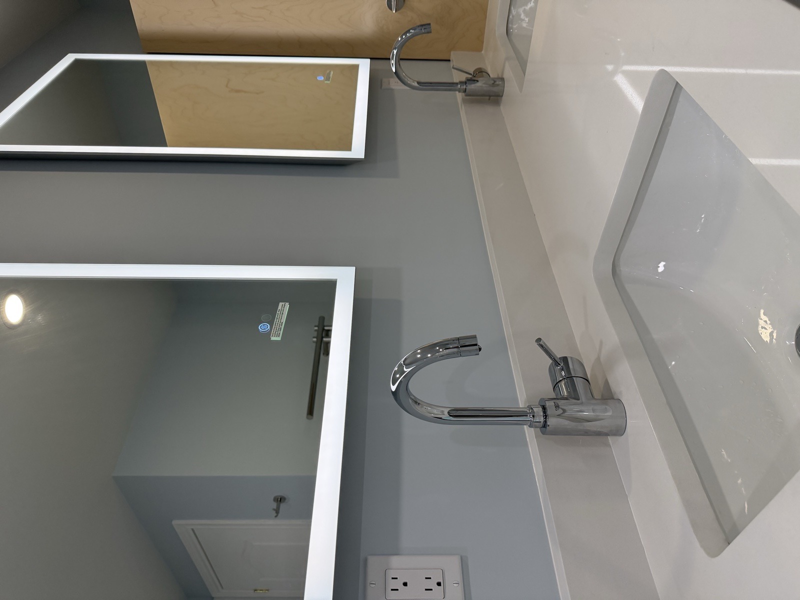 Mississauga luxury condo bathroom renovation double vanity faucets led mirrors