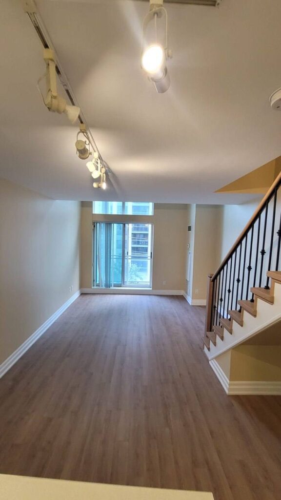 Modern North York condo loft-style living space after renovation.
