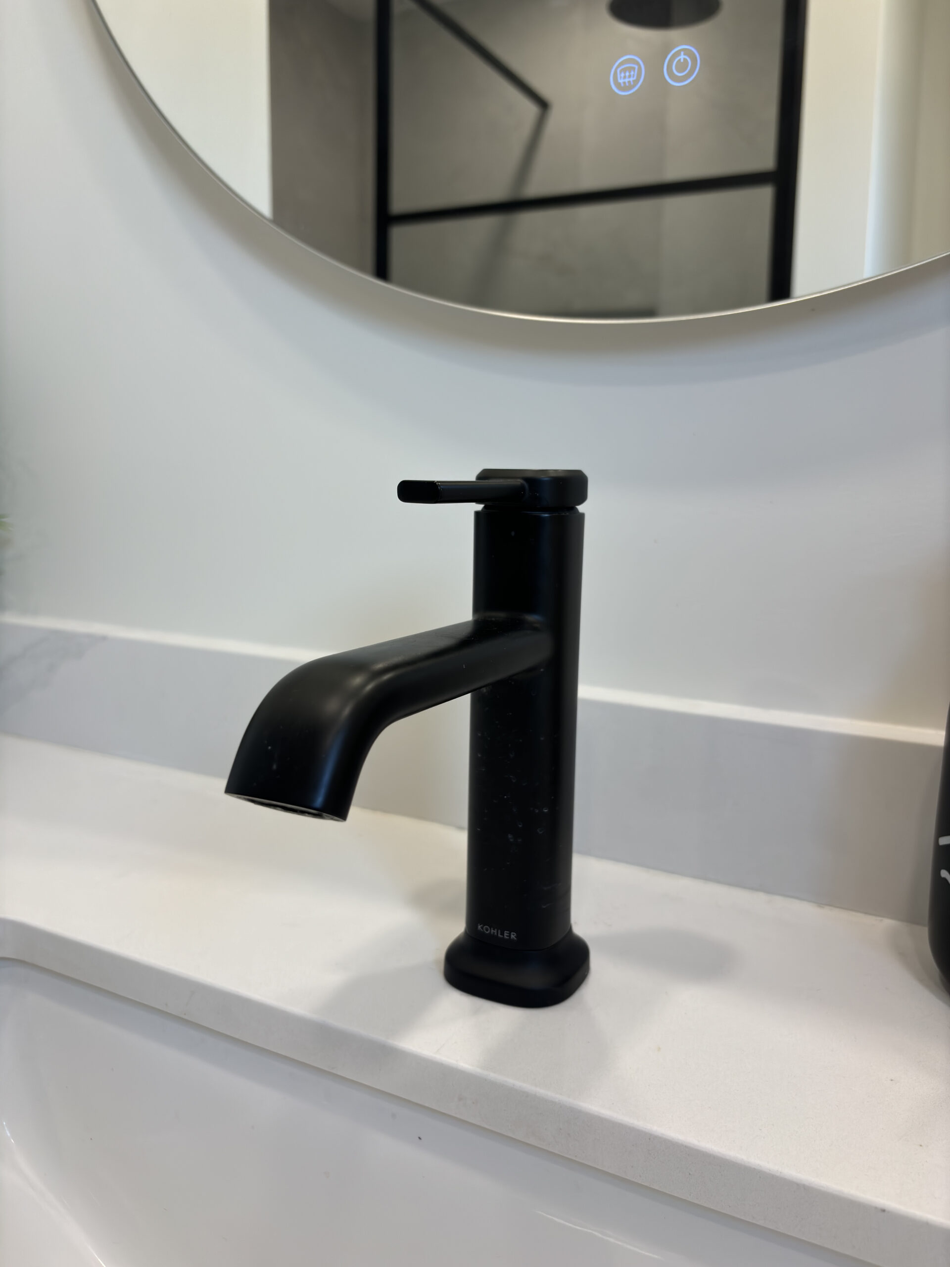 Oakville bathroom renovation kohler black faucet closeup 1 1
