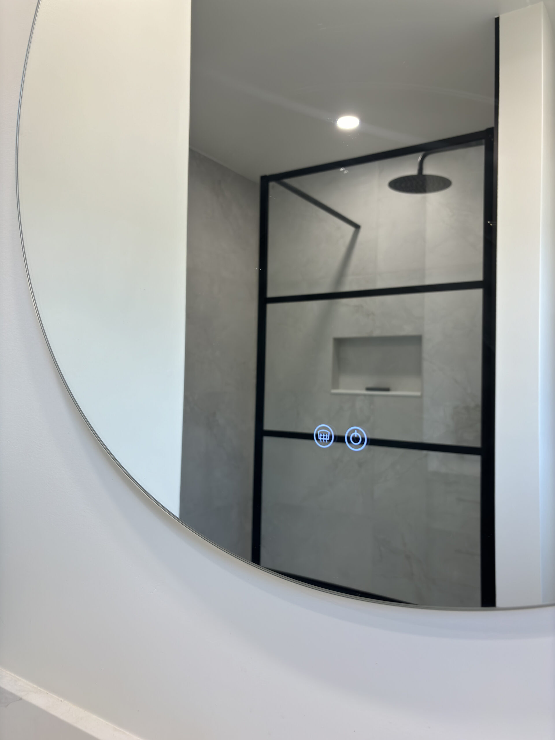 Oakville bathroom renovation round mirror reflection