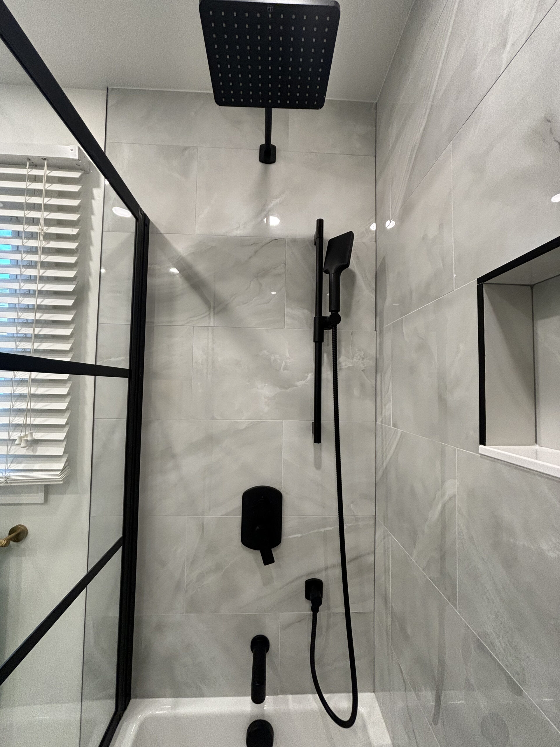 Oakville bathroom renovation rainfall shower over tub