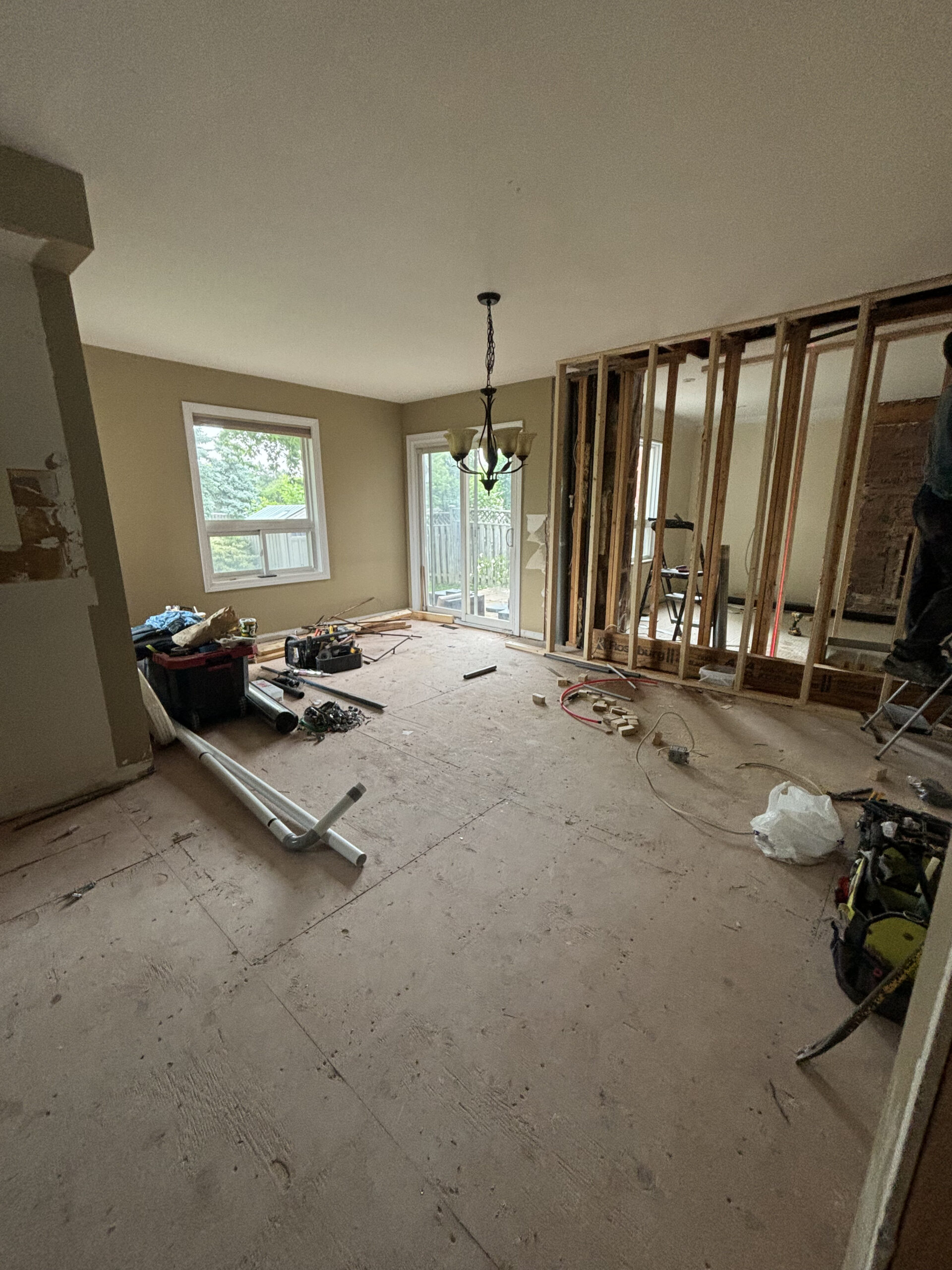 Osoba renos living room wall removal
