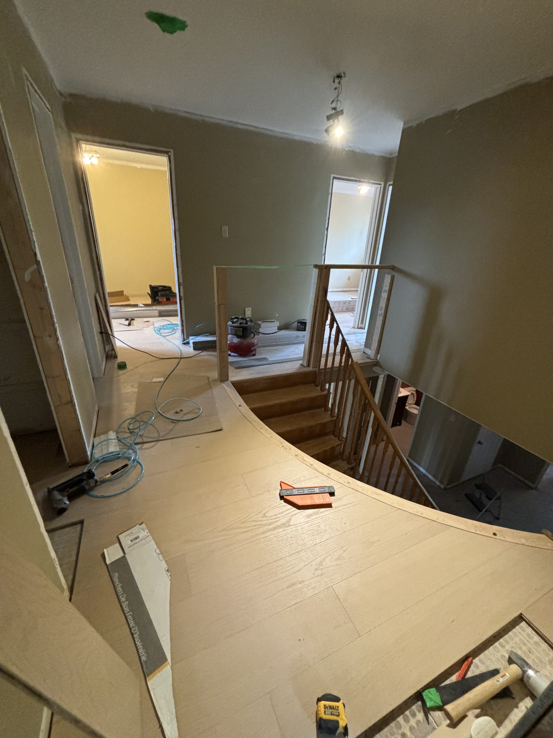 Osoba renos renovated staircase curved landing