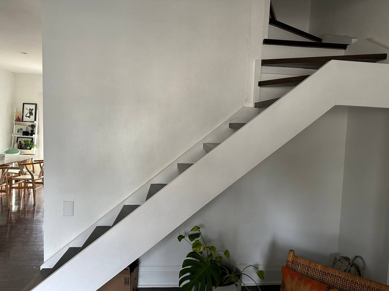Dark wood staircase full house renovation