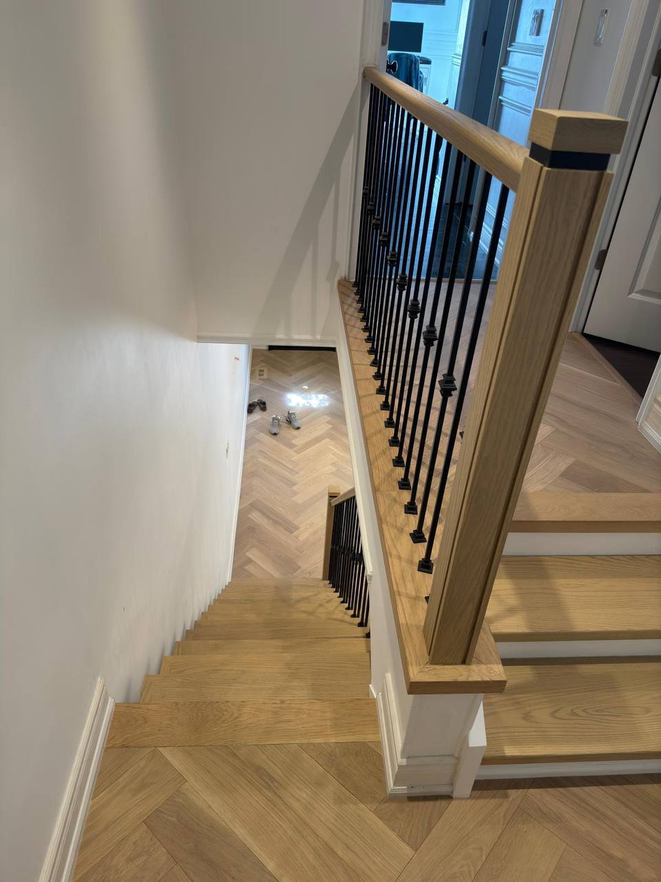 Chevron staircase matching flooring