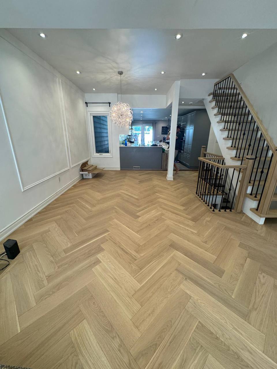 Herringbone flooring open space staircase